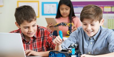 Pupils In Science Lesson Studying Robotics